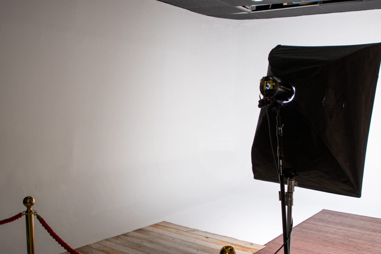 Studio lighting setup with a white backdrop.